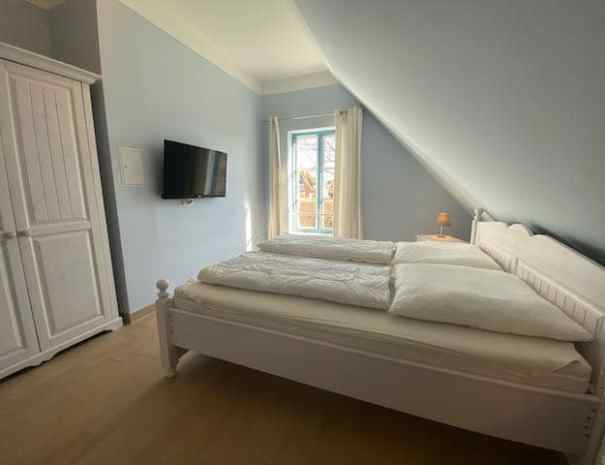 Seaside Ferienhaus Seegarten Schlafzimmer 1